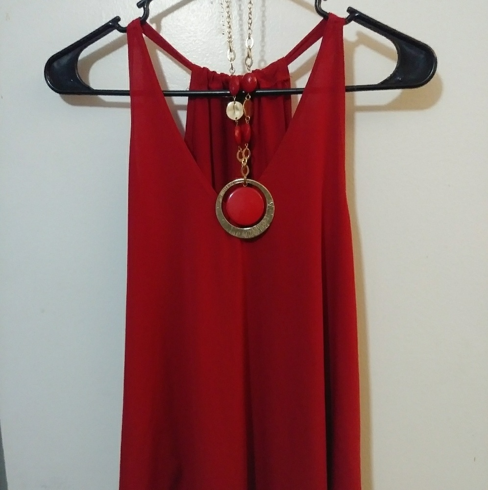 Red V cut blouse with necklace
